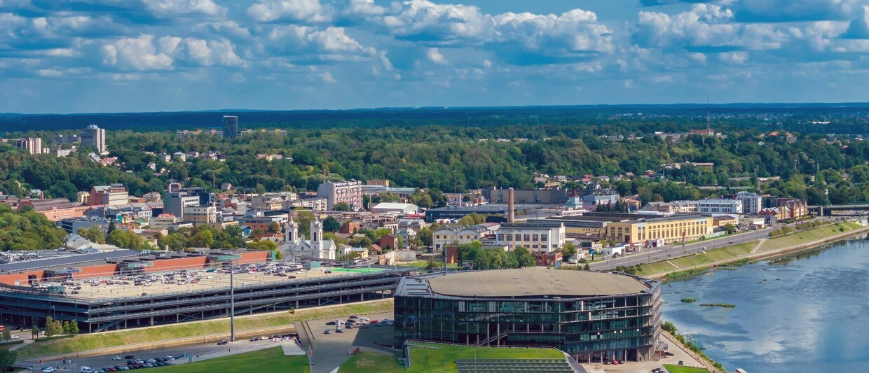 2XPJX6H Zalgiris arena, Kaunas. Aerial drone view photo. The biggest indoor sports arena in Lithuania and Baltic states located in Nemunas island