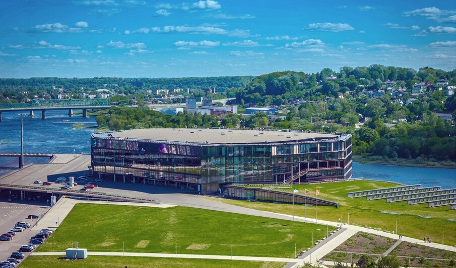 2X6TWYA Zalgiris arena, Kaunas. Aerial drone photo. The biggest indoor sports arena in Lithuania and Baltic states located in Nemunas island
