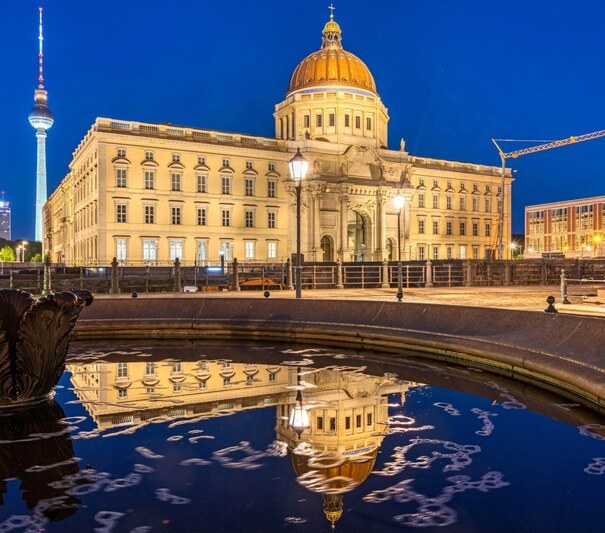 The reconstructed Berlin City Palace and the famous TV Tower at night 2G2XMN5 The reconstructed Berlin City Palace and the famous TV Tower at night