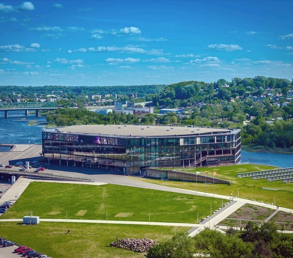 2X6TWYA Zalgiris arena, Kaunas. Aerial drone photo. The biggest indoor sports arena in Lithuania and Baltic states located in Nemunas island